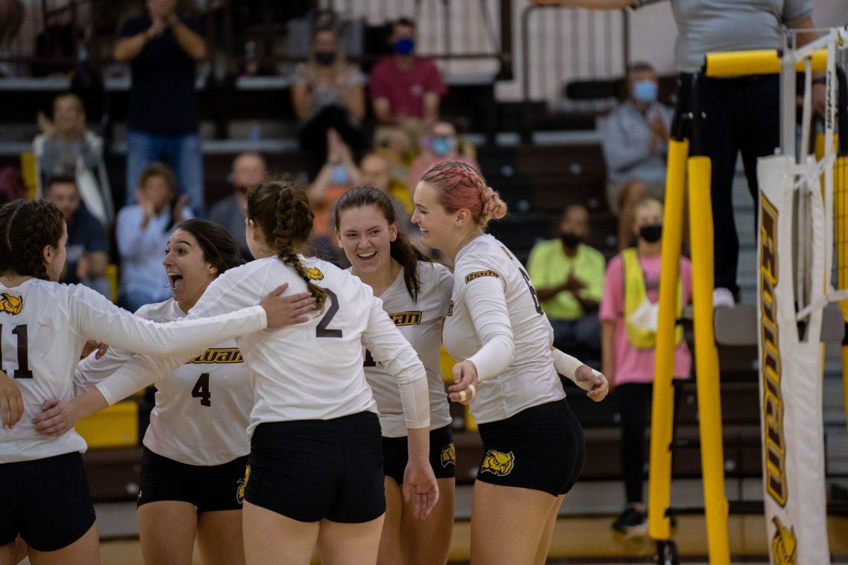 Rowan's Volleyball team coming together in a huddle during a game earlier this season. Led by Cassidy Abdalla and Natalie Ogden, Rowan is officially the first seed for the NJAC Playoffs. Thursday, Oct. 15, 2021. - Staff Photographer / Joey Nicolo