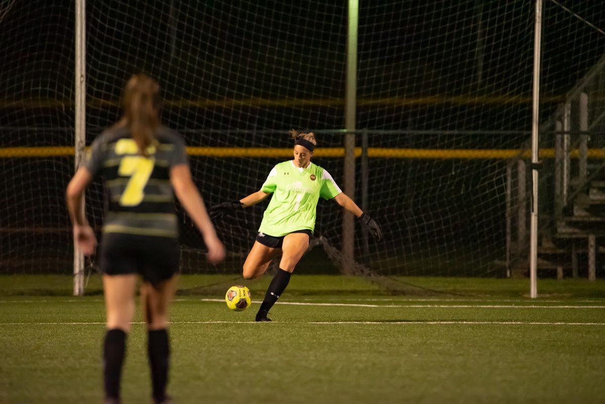 Rowan's Bristol Pizzuto clearing the ball during a game earlier this season. Pizzuto would currently has 55 saves this season but would give up two goals in their game against Montclair. Friday, Sept. 10, 2021. - Multimedia Editor / Nick Feldman