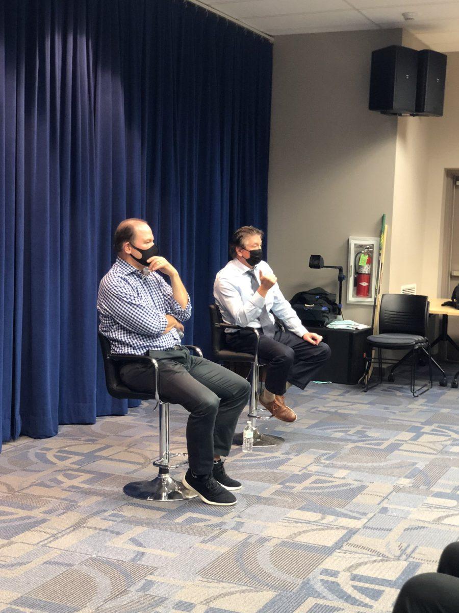 Director of the Center for Sports Communication and Social Impact, Neil Hartman (left) and Flyers Senior Director of Communications, Zack Hill (right) during Pizza with the Pros on Monday, October 11. - Photo via @rowansportscam on Twitter.com