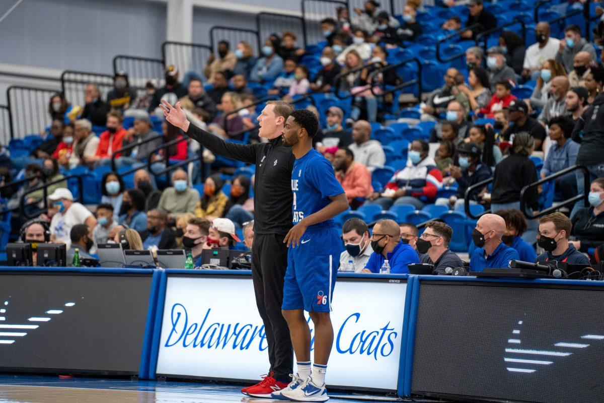 Blue Coats Head Coach Coby Karl and Tra-Deon Hollins on the sidelines. Karl would use the "small ball" approach in the team's victory over Long Island Nets. Saturday, Nov. 6, 2021. - Staff Photographer / Joey Nicolo 