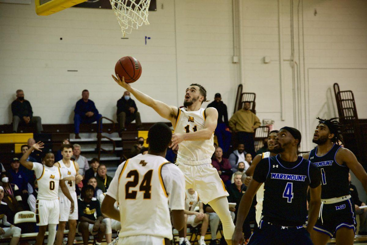 Rowan's Arian Azemi going for a layup. Azemi would score 41 points in their win over Marymount. Wednesday, Nov. 17, 2021. - Multimedia Editor / Nick Feldman