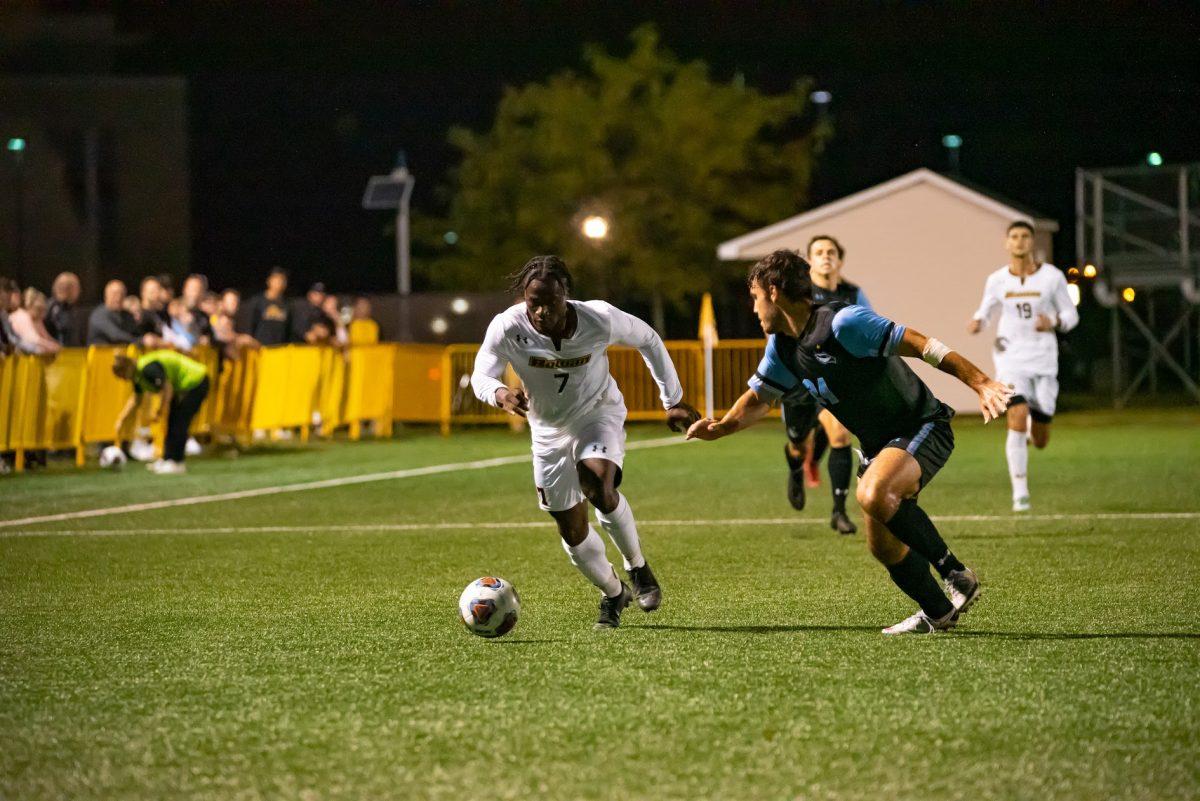 Rowan's Wilby Alfred dribbling the ball during a game earlier this season. Alfred would score the only goal in Rowan's 1-0 NJAC Playoff win over Stockton this past weekend. Wednesday, Oct. 13, 2021. - Multimedia Editor / Nick Feldman