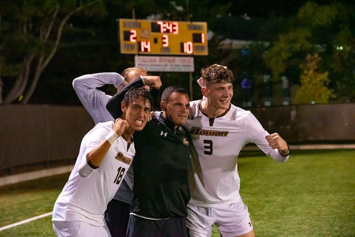 (Left to Right): Rowan's Junior Miranda, Head Coach Scott Baker, and Turlough Gartlan after a win earlier this season. Rowan will now be heading the the NCAA Division III playoffs. Wednesday, Oct. 13, 2021. - Multimedia Editor / Nick Feldman