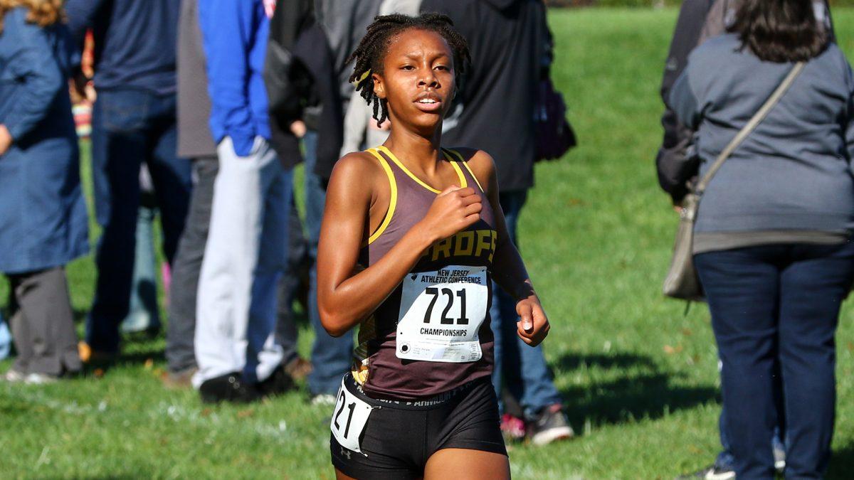 Rowan's Sha'Lynn Clarke in a race. Clarke would finish 13th at the NJAC Championships.  - Photo / Rowan Athletics.