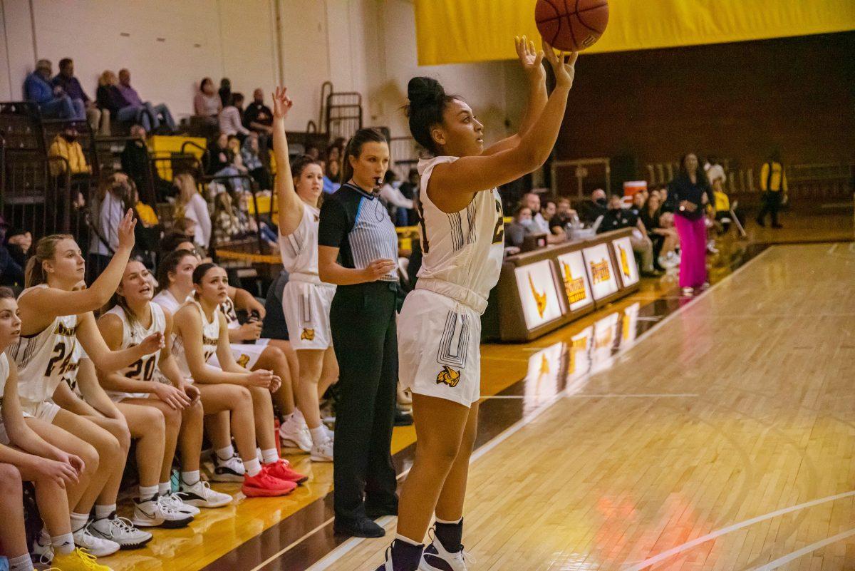 Rowan's Nicole Mallard taking a three. Mallard would record a game high 20 points in Rowan's win over Kean on Saturday afternoon. Wednesday, Dec. 1, 2021. - Multimedia Editor / Nick Feldman