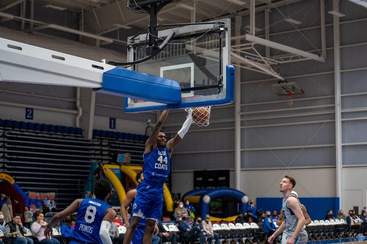 Blue Coat's Paul Reed dunking. Reed would record 28 points and 14 rebounds in their Thursday win over the Greensboro Swarm. Thursday, Jan. 27, 2022. - Staff Photographer / Joey Nicolo