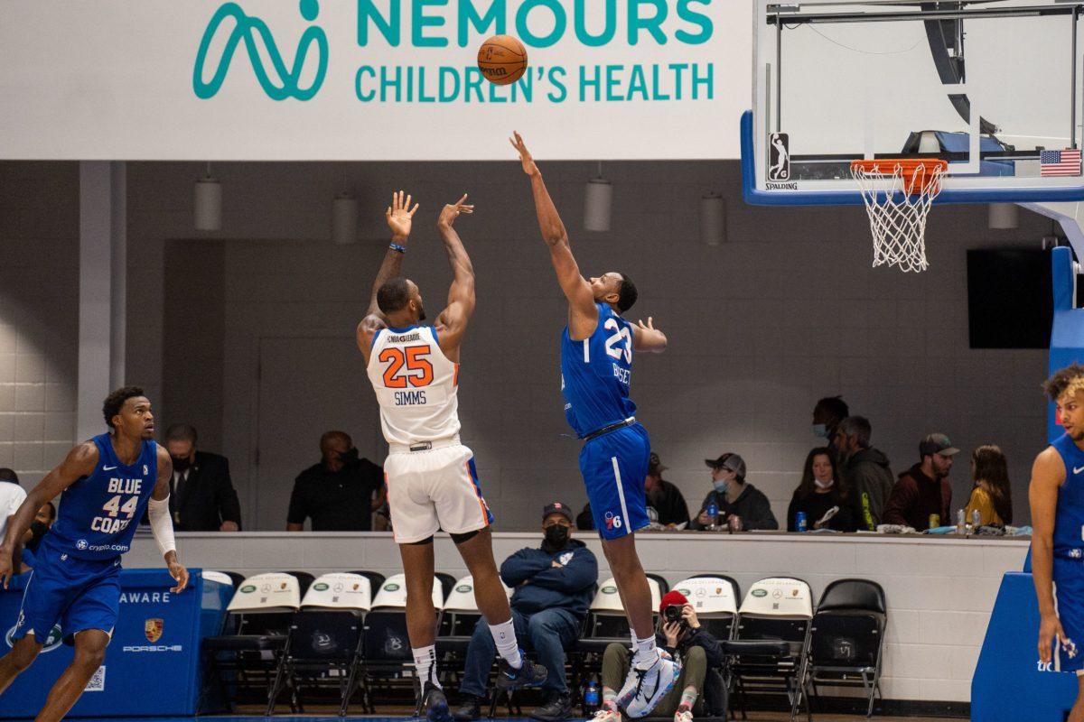 Charles Bassey attempting to block a shot. Bassey would have six blocks in the Blue Coats Friday night loss against the College Park Skyhawks. Friday, Dec. 17, 2021. - Staff Photographer / Joey Nicolo