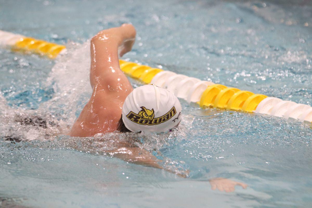 A Rowan swimmer during a race. Rowan would defeat TCNJ on Saturday to be named NJAC Champions. Saturday, Jan. 22, 2022. - Multimedia Editor / Lee Kotzen 