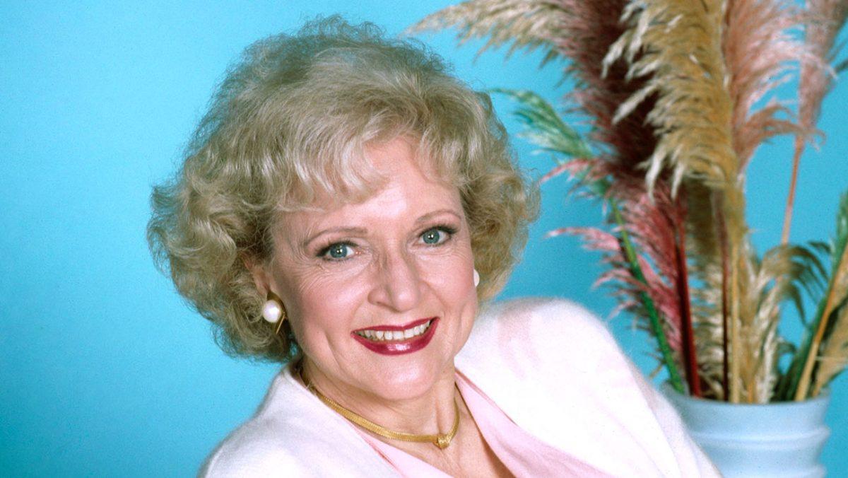 Betty White smiles during her "Golden Girls" years. / Photo via hollywoodreporter.com