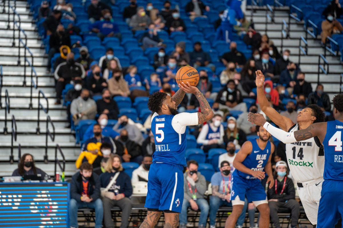 Myles Powell taking a jumper. Powell would record 19 points and ten assists on Sunday against the G League Ignite. Sunday, Jan. 30, 2022. - Staff Photographer / Joey Nicolo 