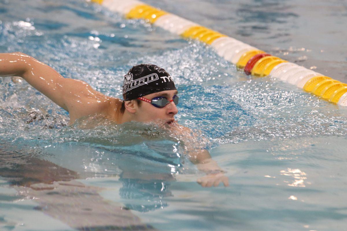 A Rowan men's swimmer pacing the pool. The Profs finished second at METS this season. Saturday, Jan. 22, 2022. - Multimedia Editor / Lee Kotzen