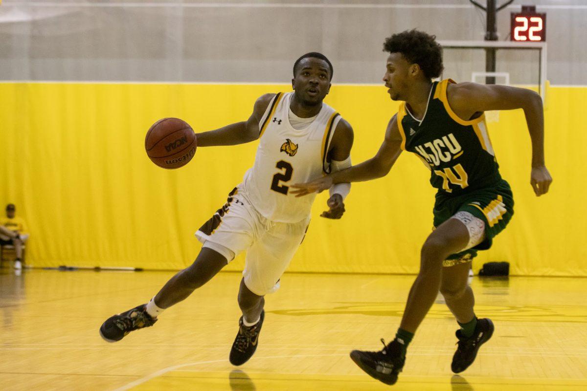 Marcellus Ross driving to the basket. Ross dropped 21 points in their quarterfinal victory on Tuesday night. Tuesday, Feb. 22. - Multimedia Editor / Lee Kotzen