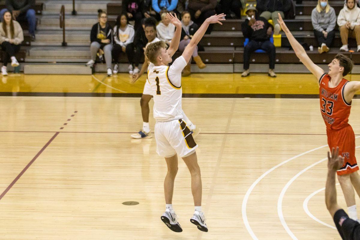 Andrew Seager after taking a three-point shot. Seager scored 17 and recorded five blocks on Saturday afternoon against Ramapo. Monday, Jan. 31, 2022. - Multimedia Editor / Lee Kotzen