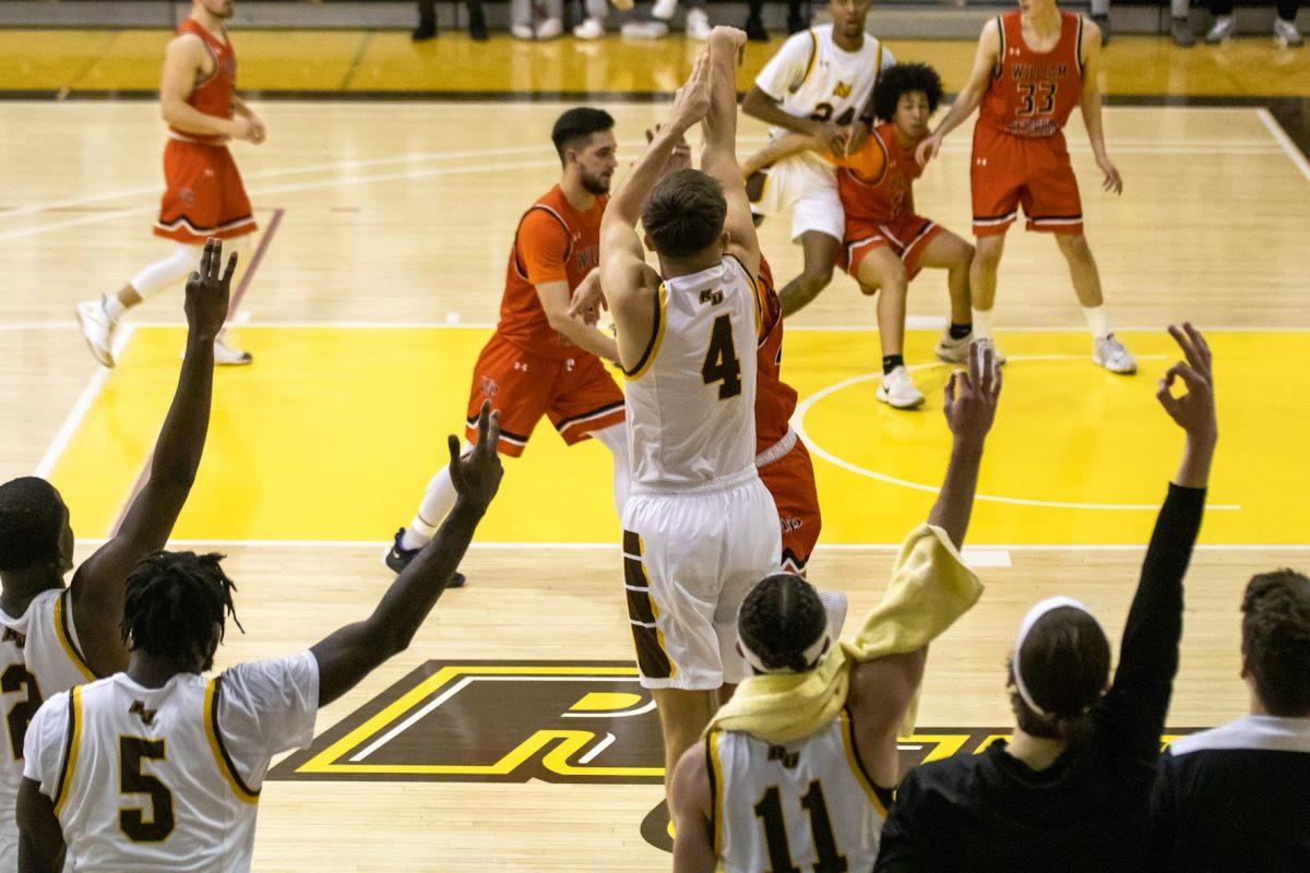 Ryan O'Leary taking a three. O'Leary and the Profs are heading towards the NJAC tournament next week.  Monday, Jan. 31, 2022. - Multimedia Editor / Lee Kotzen