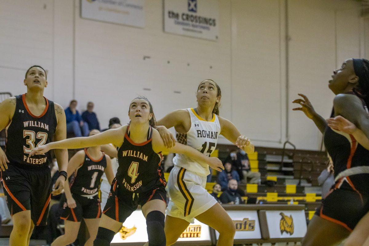 Dakota Adams and a William Paterson player setting up to get the rebound. Adams would have her career best night scoring 23 points on Monday against the Pioneers. Monday, Jan. 31, 2022. - Multimedia Editor / Lee Kotzen