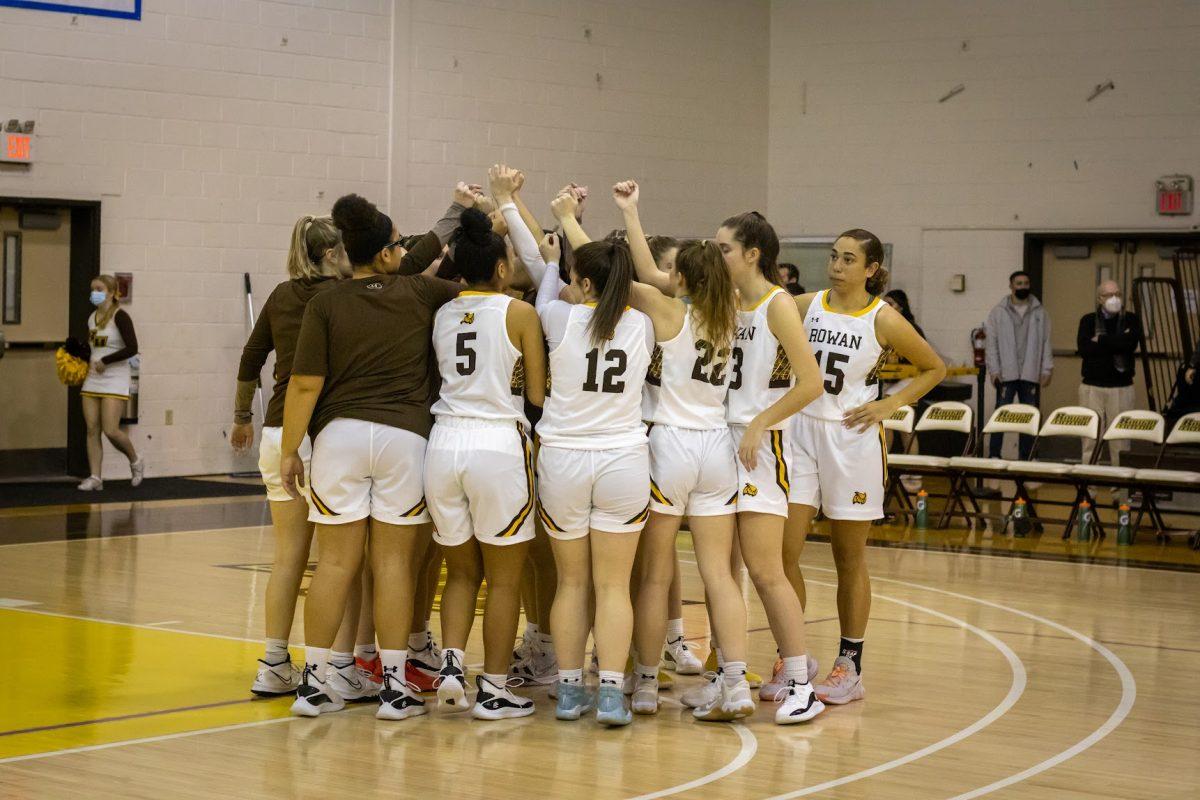 The women's basketball team breaking their huddle before a game. Rowan heads into the NJAC tournament as one of the top seeds. Monday, Jan. 31, 2022. - Multimedia Editor / Lee Kotzen