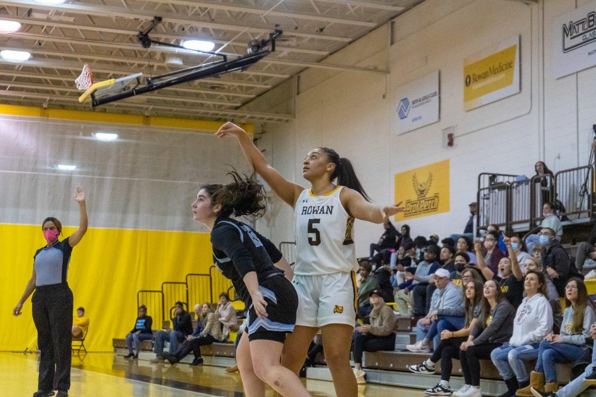 Nicole Mallard after a three-point attempt. Mallard was the leading scorer for Rowan on Tuesday night with 27 points. Tuesday, Feb. 22. - Staff Photographer / Joey Nicolo