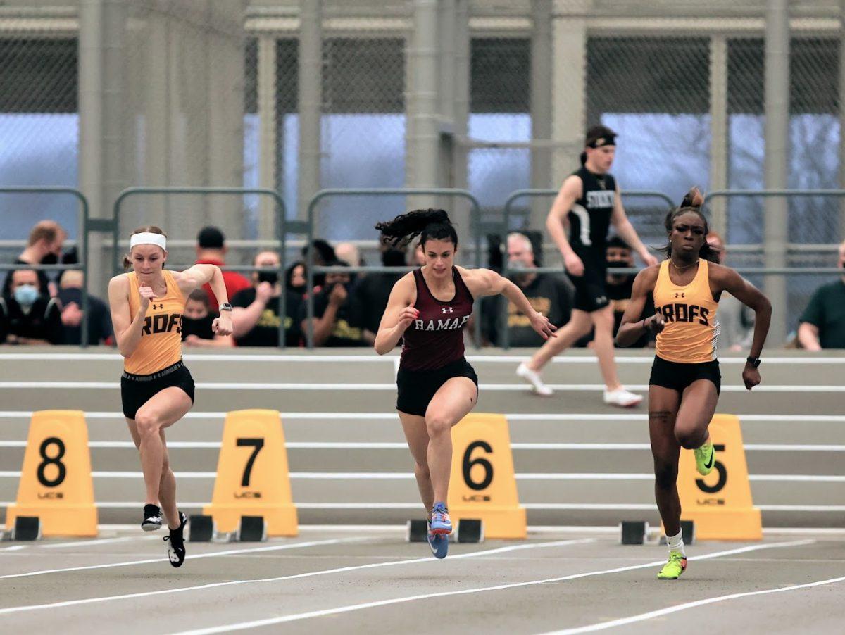 Molly Lodge and Promise Fadahunsi during the 60-meter dash. Lodge and Promise finished third and second at the NJAC Championships. Photo / Ian Dubac @IanMatthewPhotography 