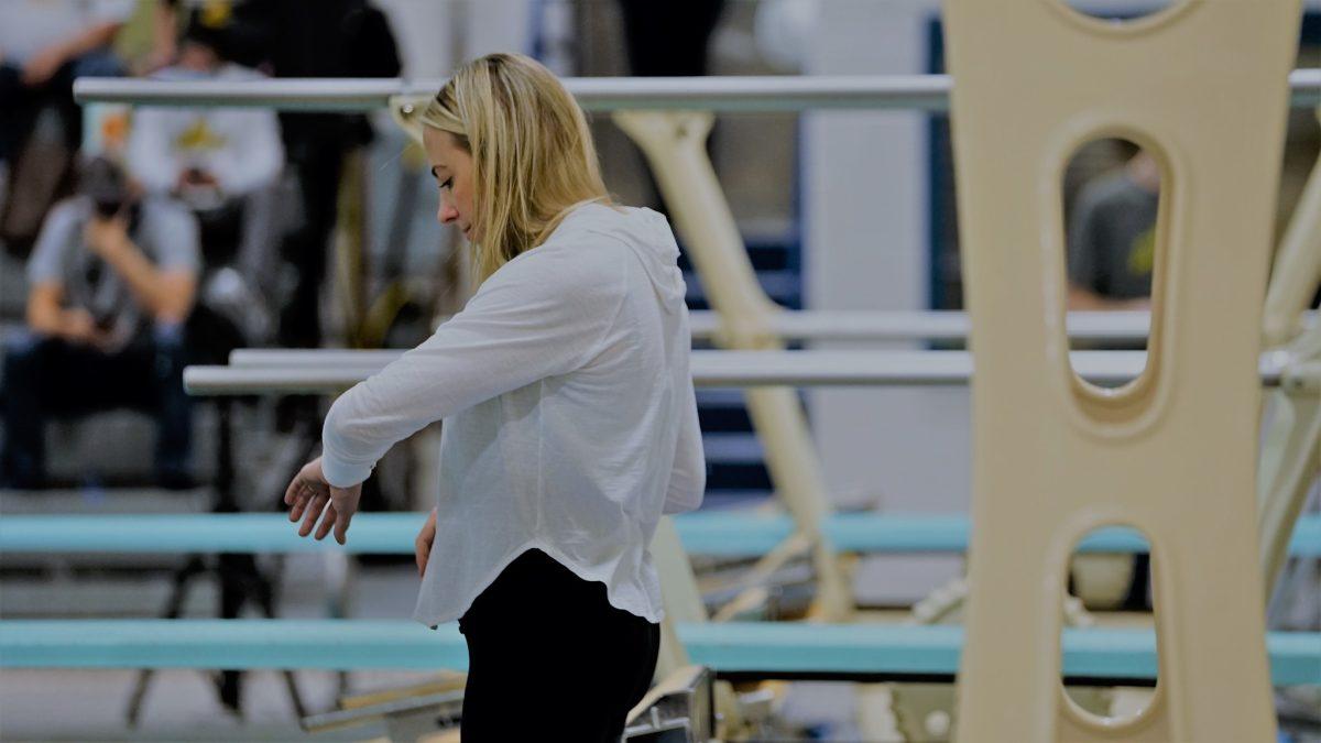 Head Coach Elise Blaschke during a meet. In the 2021-2022 season, Coach Blaschke lead her team to their second NJAC Championship under her reign. Saturday, Jan. 22, 2022. - Staff Photographer / Ashley Craven