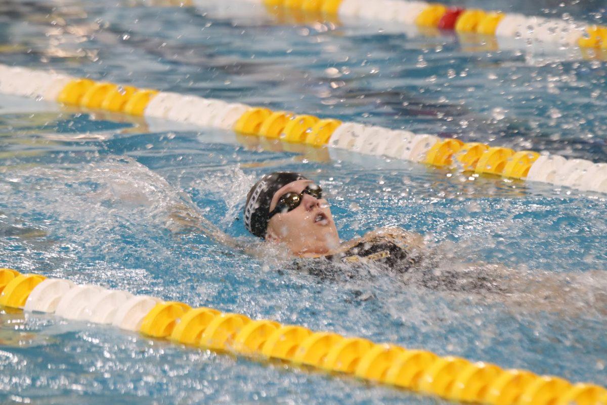 Kylie Salerno swimming the backstroke. Salerno is one of the captain on Rowan women's swimming & diving team. Saturday, Jan. 22, 2022. - Multimedia Editor / Lee Kotzen