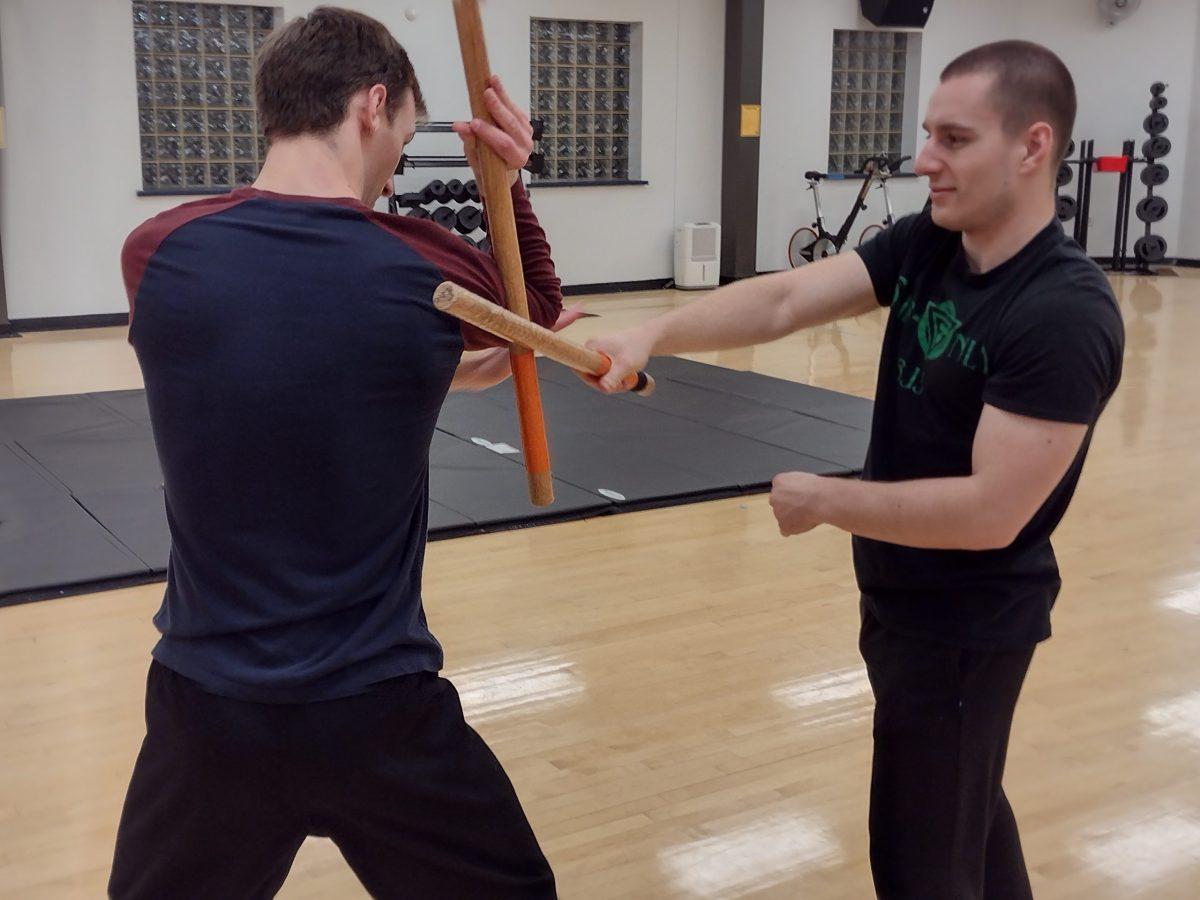 Rick Bellia practicing with a fellow member of the club. Bellia is someone who joined the club with prior martial arts experience. - Photo / Anna Boddy  