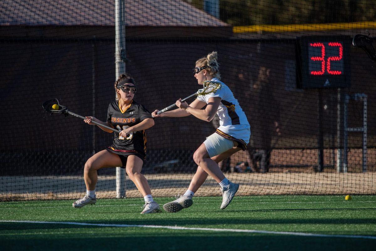 Erin Scioli guarding an opponent in a game earlier this season. Scioli and the defense gave up 13 goals in their loss to Scranton on Wednesday night. Wednesday, Feb. 23. - Photo / Nick Feldman