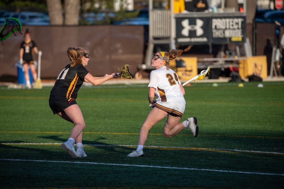 Molly Green on the attack against Ursinus. Green, as a freshman, has already 11 goals in her career at Rowan. Wednesday, Feb. 23, 2022. - Photo / Nick Feldman