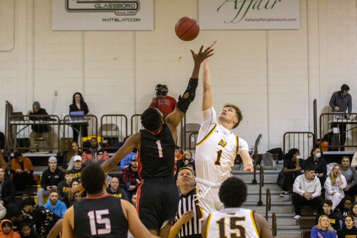 Andrew Seager going up for the opening tipoff. Seager will be a key factor for Rowan's 2023 team. Thursday, Feb. 24, 2022. - Multimedia Editor / Lee Kotzen