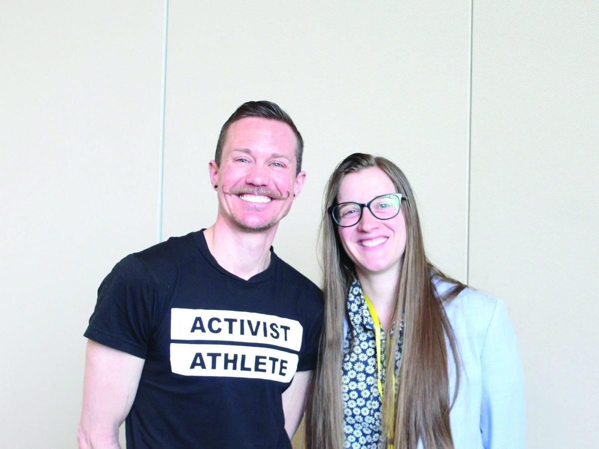 Chris Mosier and Kate Harman stand together following their discussion on transgender athletes in sports. - Photo / Berry Andres