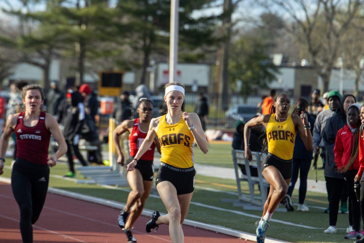 Molly Lodge in the 200 meter dash at the Oscar Moore Invitational. Lodge finished in first in the event. Saturday, March 26, 2022. - Multimedia Editor / Lee Kotzen