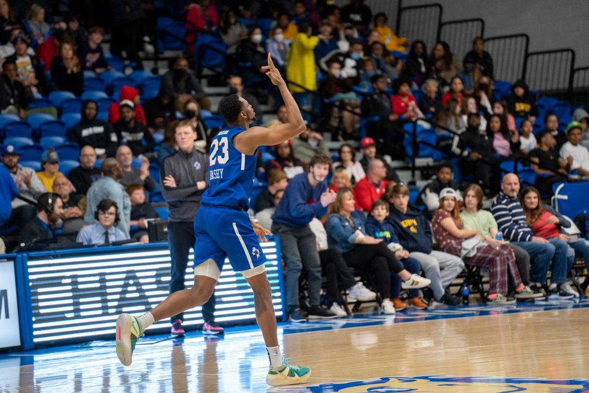 Charles Bassey running back down the court earlier this season. Bassey had a career best in points and rebounds on Saturday night against the Wisconsin Herd. Friday, March 25, 2022. - Staff Photographer / Joey Nicolo