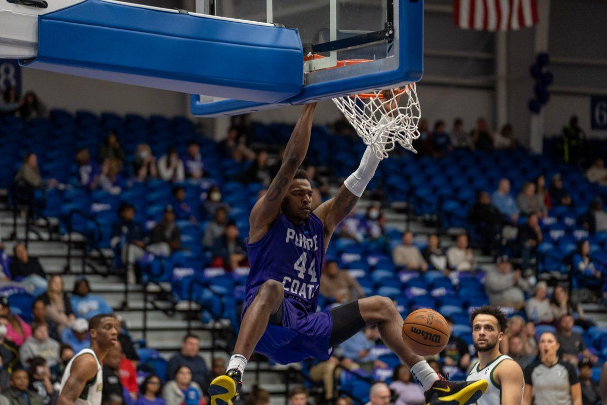 Paul Reed after a slam dunk against the Wisconsin Herd. Reed recorded 18 points and 16 rebounds in their victory on Friday night. Friday, April 1, 2022. - Staff Photographer / Joey Nicolo