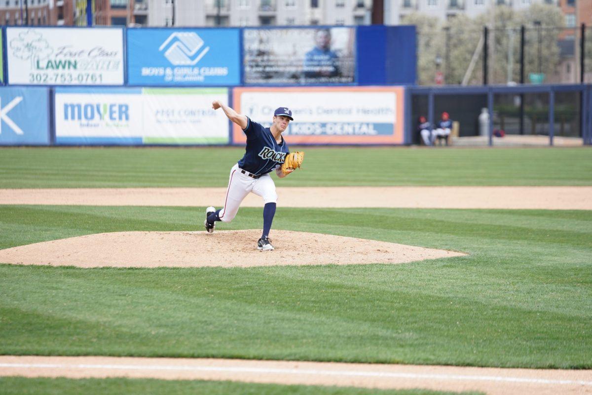 Jake Irvin throwing a pitch against the Cyclones. Irvin would pitch three innings and record four strikeouts in his first outing of 2022. Sunday, April 10, 2022. - Staff Photographer / Ashley Craven