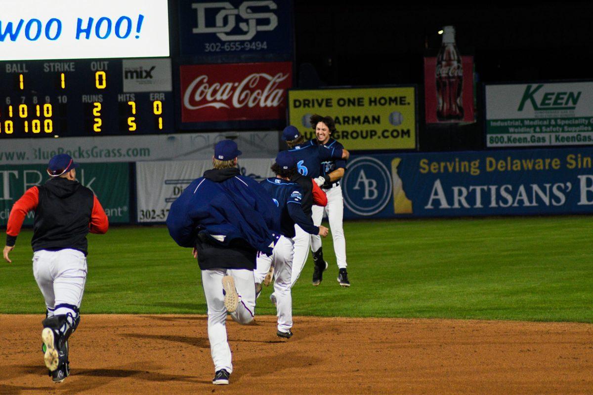 Drew Mendoza and the team celebrating after the game. Mendoza hit a walk-off single to capture  the 3-2 victory. Saturday, April 23, 2022. - Staff Photographer / Tyrese Williams 