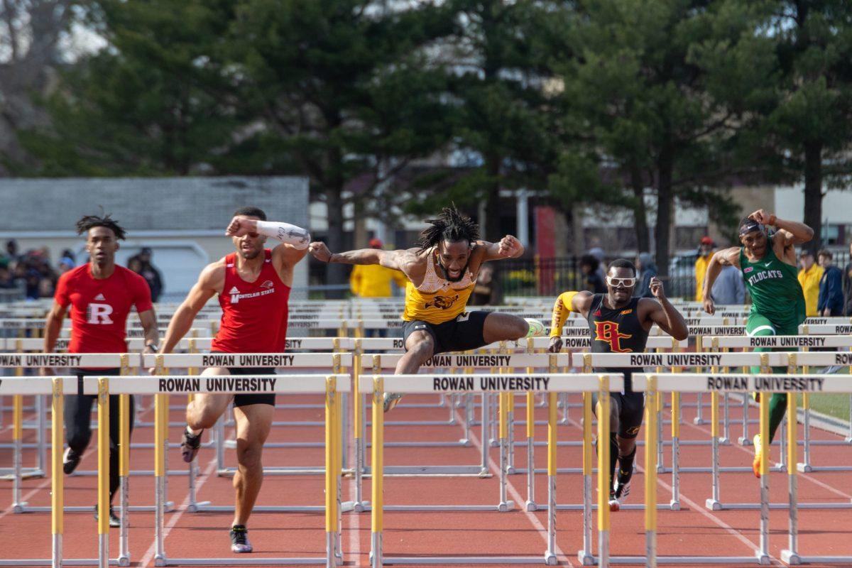 Marquise Young during a hurdles event earlier this season. Young has already won National Championships during his first year at Rowan. Saturday, March 26, 2022. - Multimedia Editor / Lee Kotzen