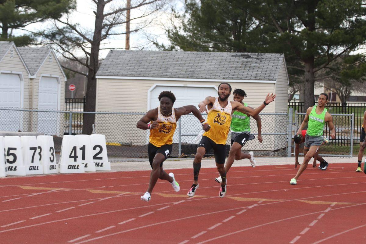 Jah'mere Beasley passing the baton to Nana Agyemang in a relay race earlier this season. Agyemang had multiple first and second place finishes this past weekend. Saturday, March 26, 2022. - Multimedia Editor / Lee Kotzen