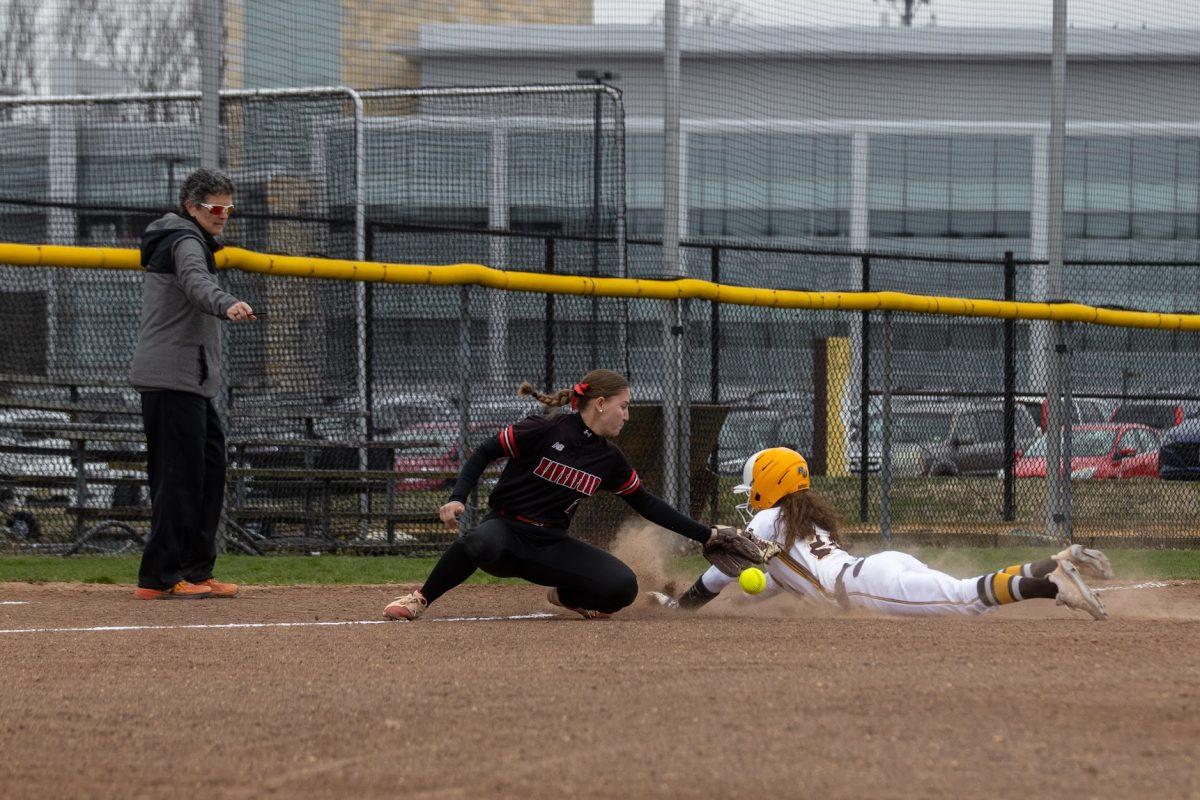 McKenzie Melvin diving into third. Melvin leads the team in stolen bases and hits. Wednesday, March 30, 2022. - Multimedia Editor / Lee Kotzen