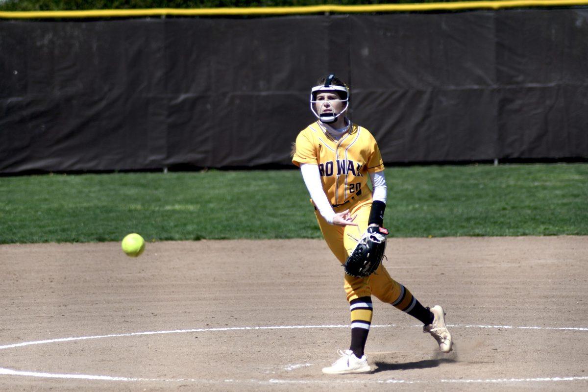 Emily August after throwing a pitch earlier this season. August struck out 13 batters in the two games she pitched in on Saturday afternoon. Saturday, April 2, 2022. - Staff Photographer / Tyrese Williams