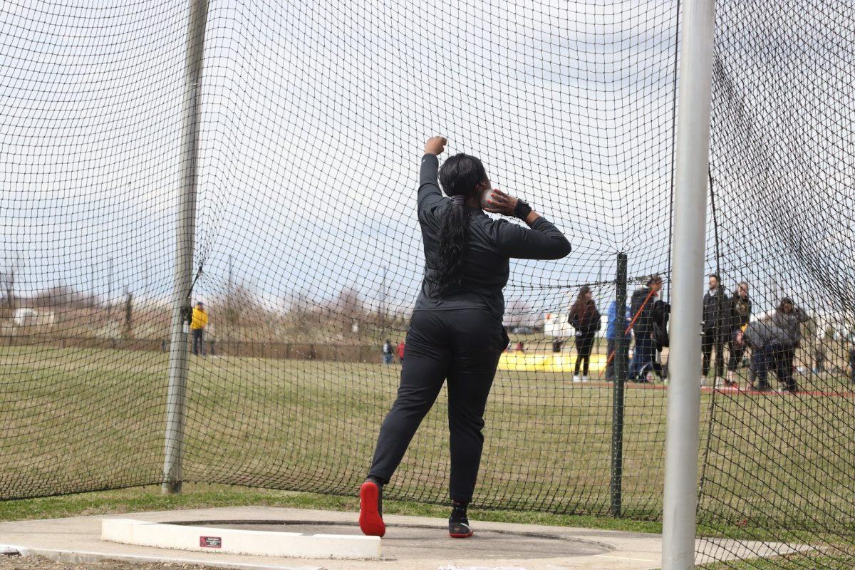 Makayla Taylor before a throw. Taylor broke her record this past weekend. Saturday, March 26, 2022. - Multimedia Editor / Lee Kotzen