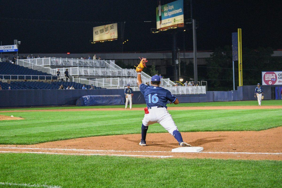 Omar Meregildo catches a ball at first base. Meregildo went 3-5 on Sunday and was ejected from the game in the ninth inning. Friday, May 20, 2022. - Staff Photographer / Tyrese Williams