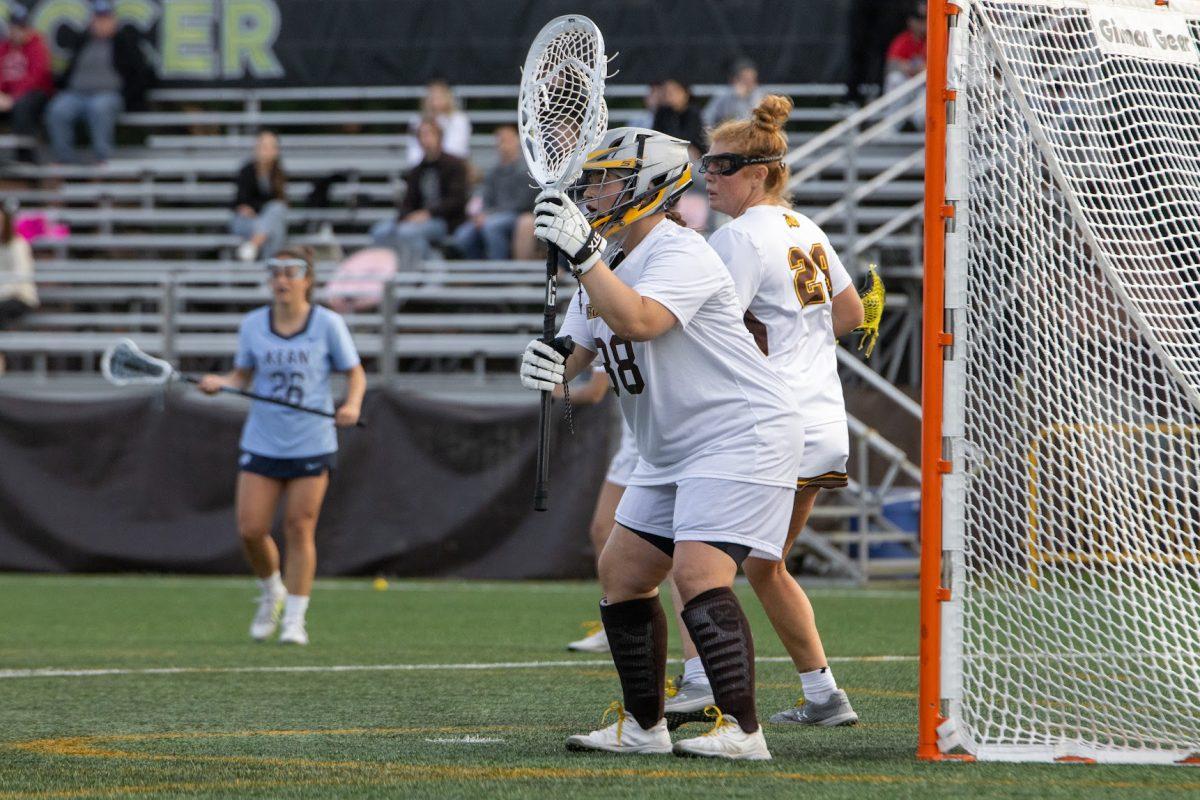 Reilly Shaup and Julianna Corson defend Rowan's goal. Rowan's defense have been a key aspect in their winning streak. Saturday, April 23, 2022. - Multimedia Editor / Lee Kotzen