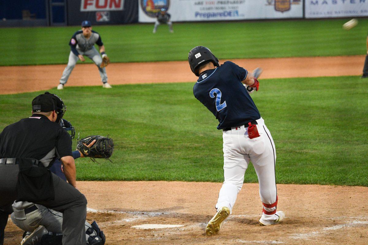 Nick Banks makes contact with the ball. Banks would be responsible for three of the four runs in the Blue Rocks victory on Friday night. Friday, June 17, 2022. - Staff Photographer / Tyrese Williams