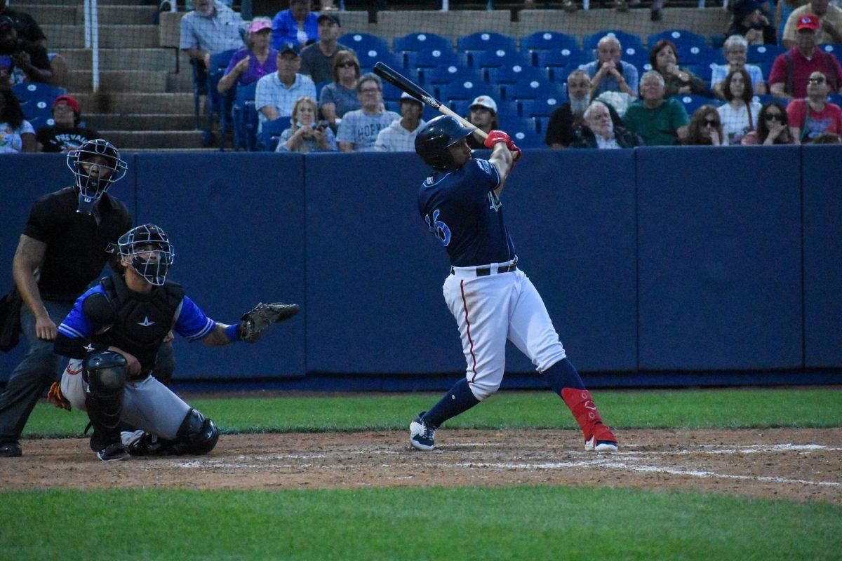 Omar Meregildo after he made contact with the ball. Meregildo hit one of the Blue Rocks' two home runs on Tuesday night. Saturday, May 28, 2022. - Staff Photographer / Jarquil Young