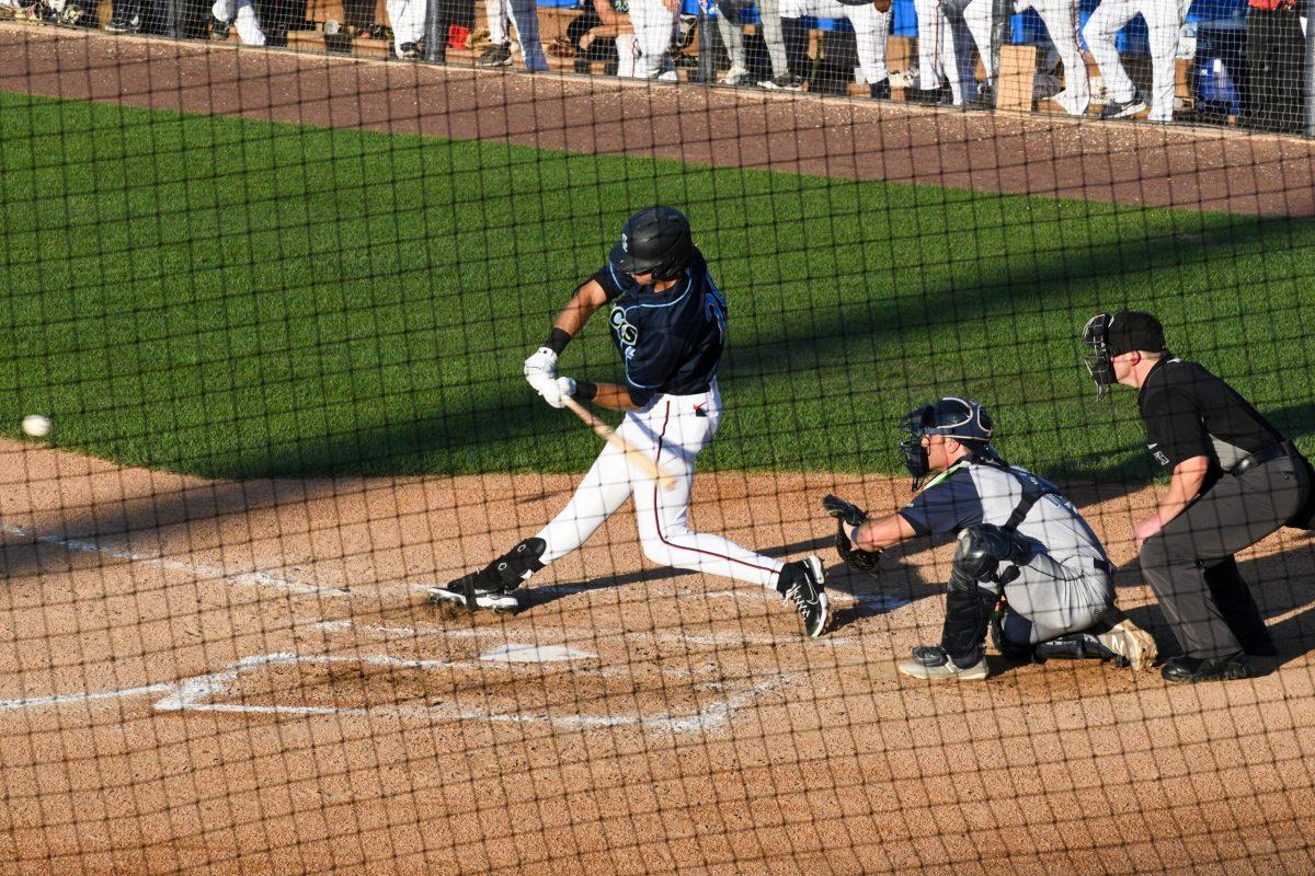 Drew Mendoza swings at a pitch. Mendoza recorded a home run, triple, and double in the Blue Rocks win Tuesday night. Friday, June 17, 2022. - Staff Photographer / Tyrese Williams 