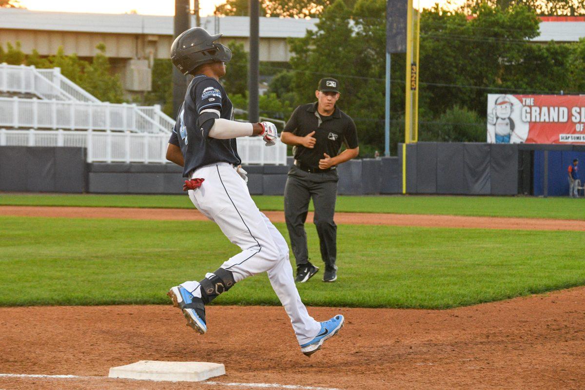 Darren Baker is called out on first earlier this season. Baker recorded one of the only three hits for the Blue Rocks in their loss Wednesday night. Saturday, June 18, 2022. - Staff Photographer / Tyrese Williams