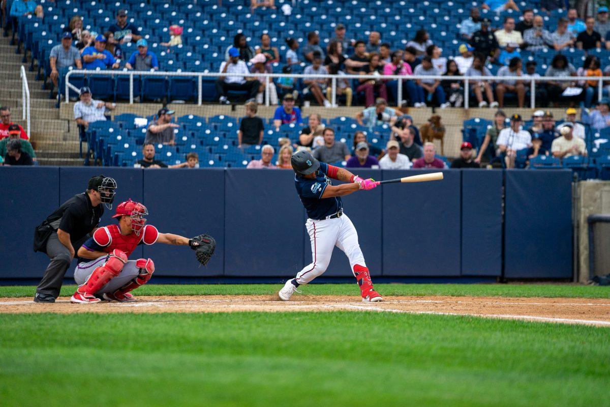 Onix Vega swings at a pitch earlier in the series. Vega's home run on Wednesday afternoon was the game winning run. Tuesday, July 26, 2022. - Staff Photographer / Ashley Craven