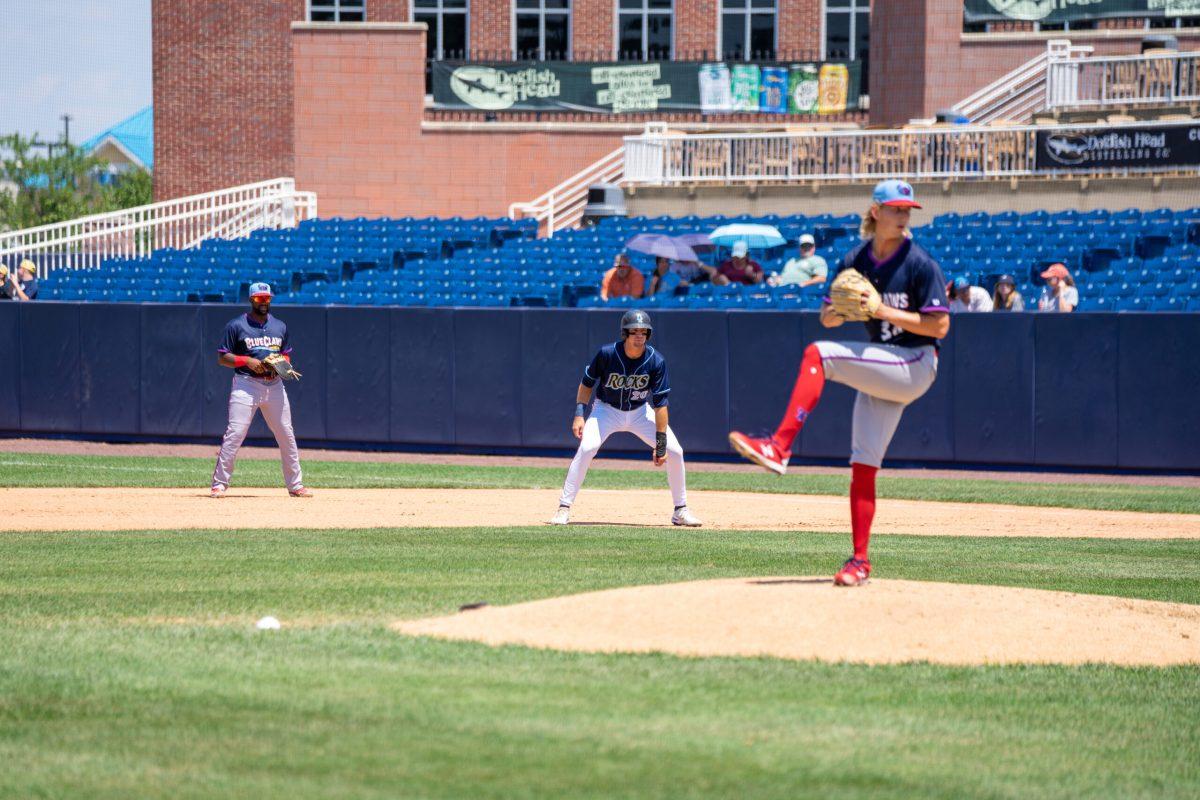 Drew Mendoza on base while Ben Brown throws a pitch earlier this season. The Blue Rocks left six men on base in their loss to Jersey Shore on Saturday night. Sunday, July 3, 2022. - Staff Photographer / Ashley Craven