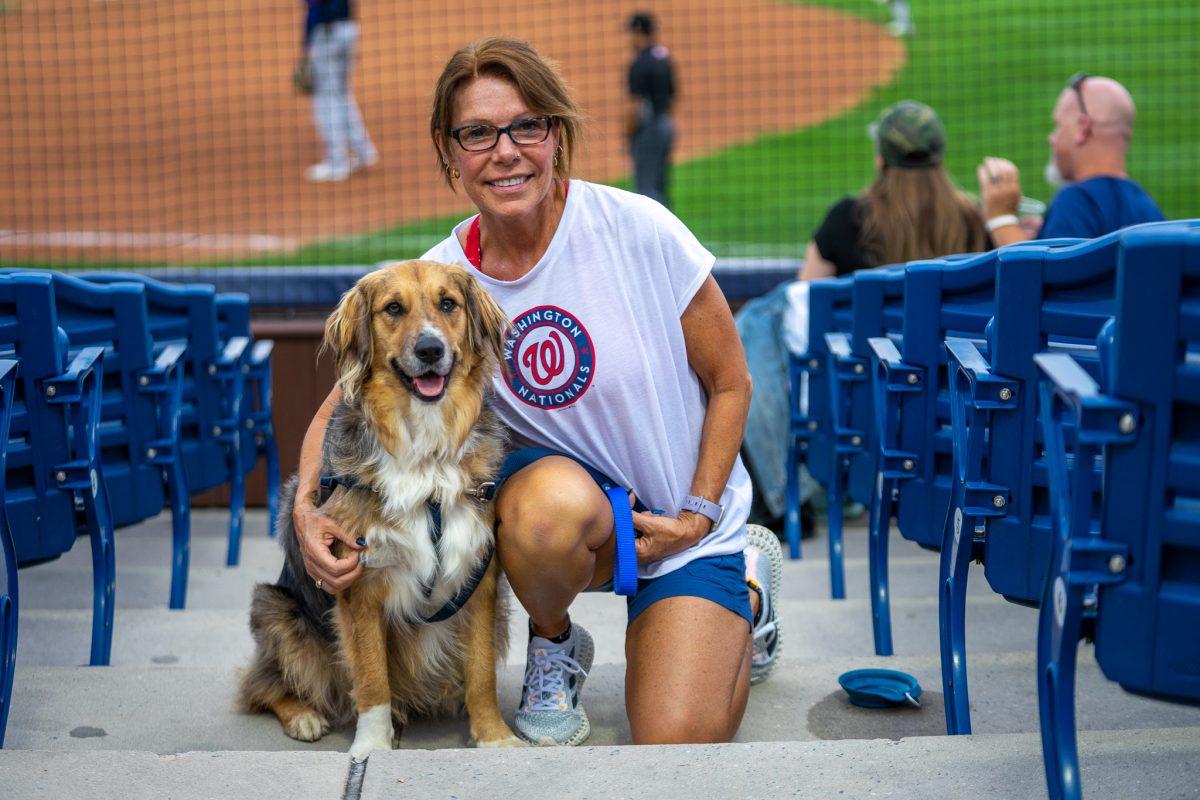 Isabeau poses with her human, Suzanne. Tuesday, July 26, 2022. - Staff Photgrapher / Ashley Craven