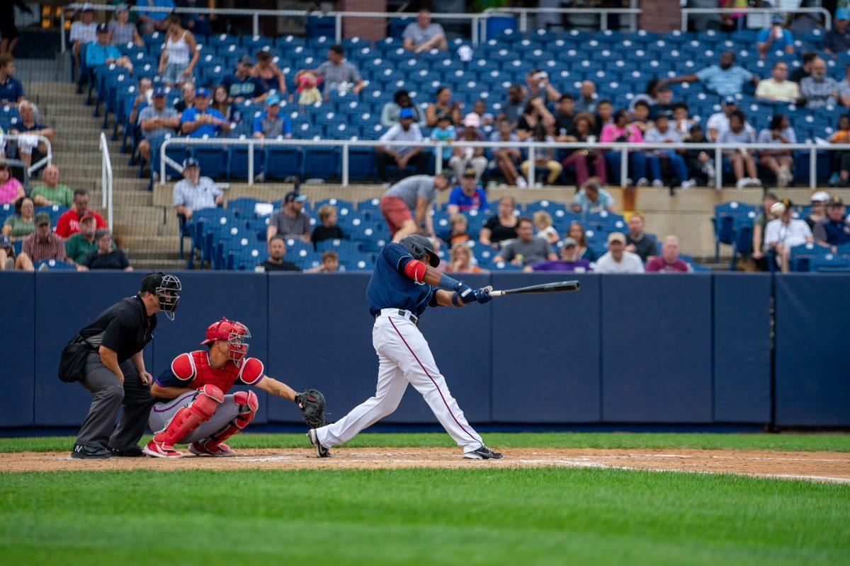 Yasel Antuna swings at a pitch earlier this season. Antuna recorded a hit and an RBI in the Blue Rocks' win on Saturday night. Friday, July 26, 2022. - Staff Photographer / Ashley Craven