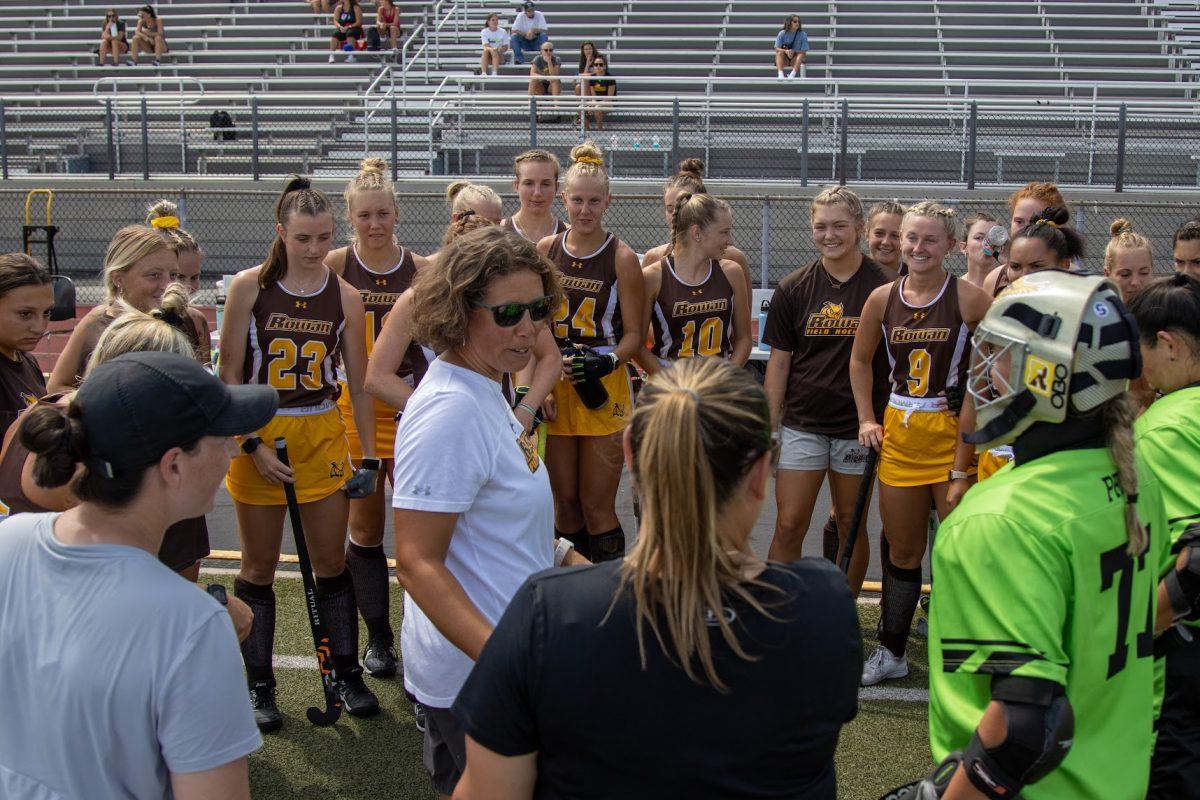 Head Coach Michelle Andre talks to her team pregame. Coach Andre picked up her 100th victory in Saturday's afternoon win over Haverford. Saturday, Sept. 3, 2022. - Multimedia Editor / Lee Kotzen